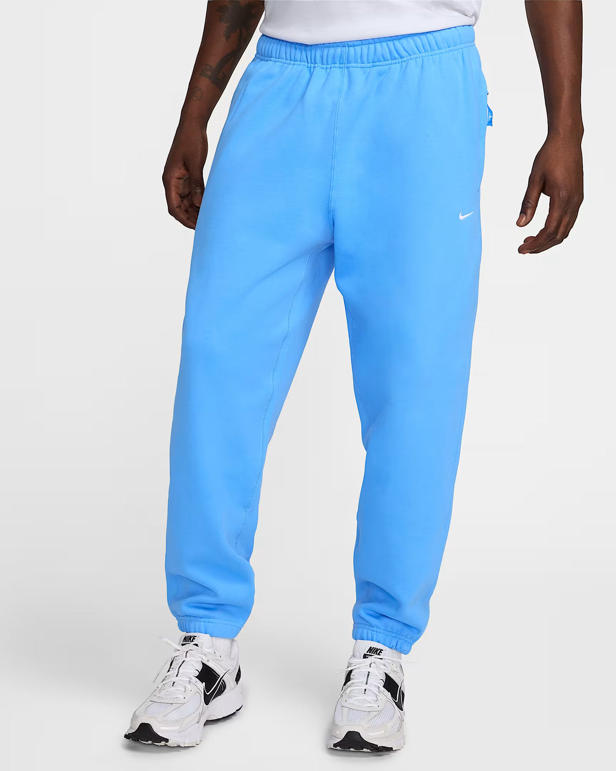Nike Men's/Hombre Joggers/Pantalón Deportivo "SOLO SWOOSH" al por Mayor - Precio por unidad: $21.50 USD