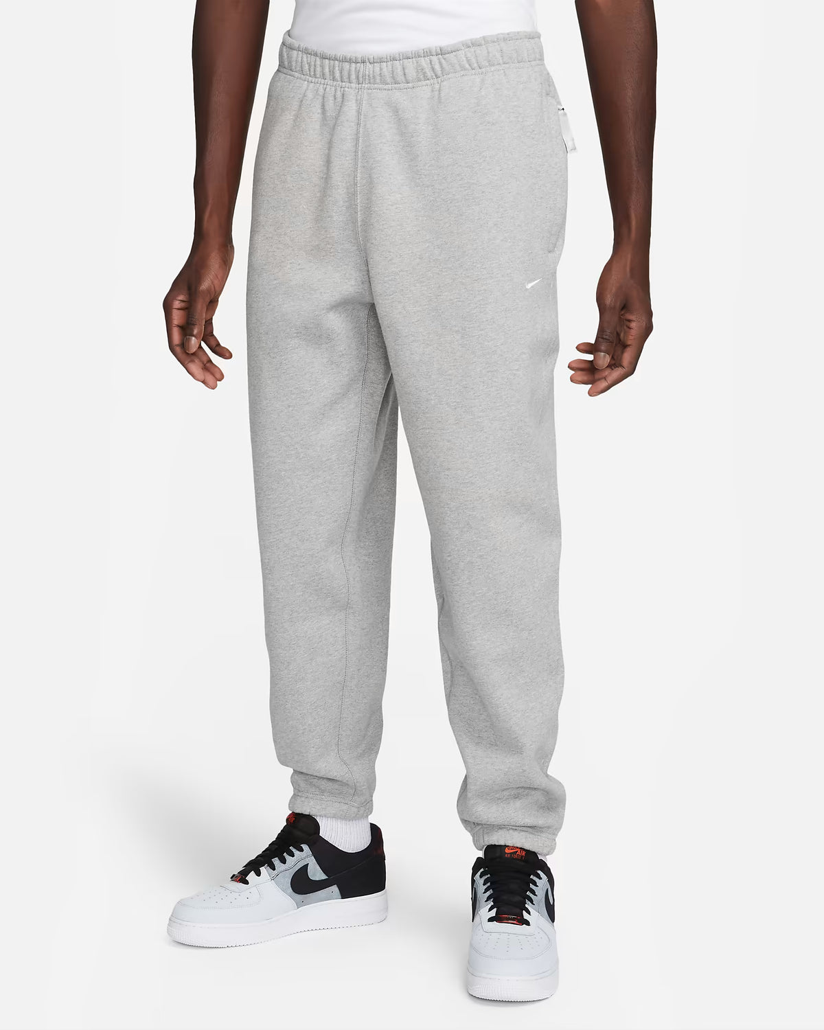 Nike Men's/Hombre Joggers/Pantalón Deportivo "SOLO SWOOSH" al por Mayor - Precio por unidad: $21.50 USD
